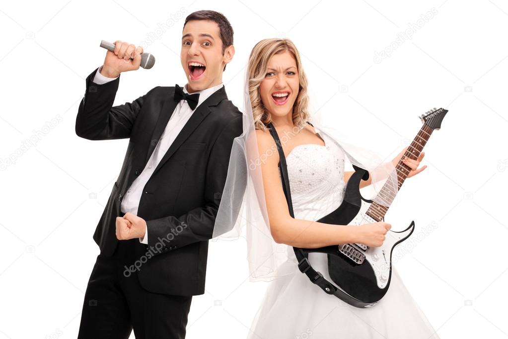 Bride playing guitar and a groom singing 