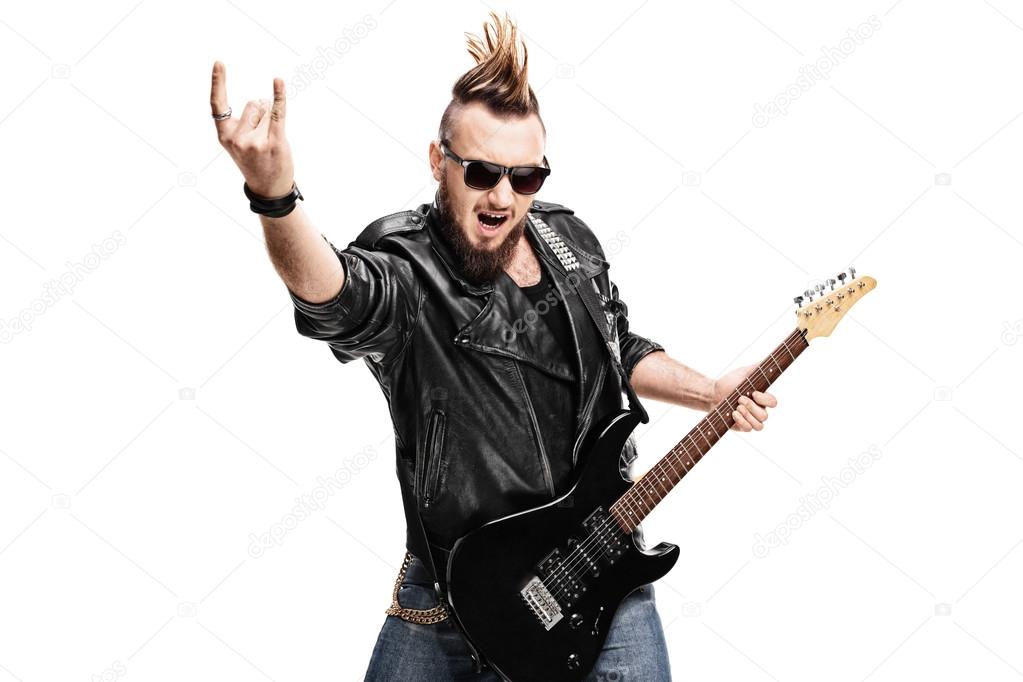 rock guitarist making rock gesture
