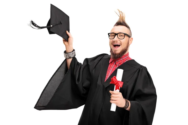 Man med en Mohawk firar examen — Stockfoto