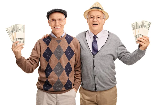 Starší pánové koudel drží peníze — Stock fotografie