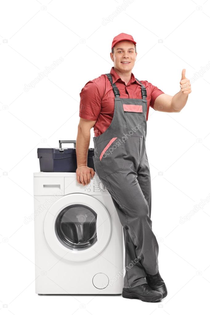 Male repairman giving a thumb up 