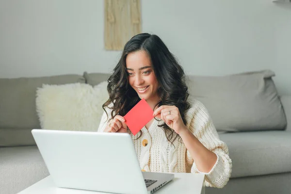 Young woman on a video call date, online. Quarantine. Rest at home. Card.