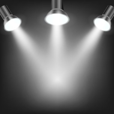 Koyu arka planda beyaz sahne ışıkları