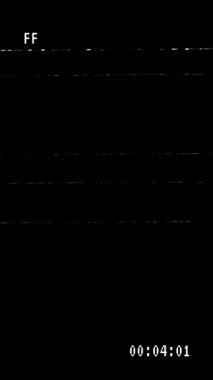 Eski VHS Teybi FF Hızlı İleri Analog TV 'yi Alfa kanalında Saptırılmış ve Zaman Kodu ile görüntüle. 4K Video