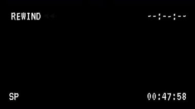 VHS Siyah arkaplan üzerindeki zaman kodlarıyla ekranı geri sar. 4K Video
