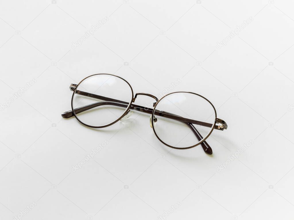vintage glasses isolated on a white background. For reading daily life To a person with visual impairment. White background as background health concept with copy space.