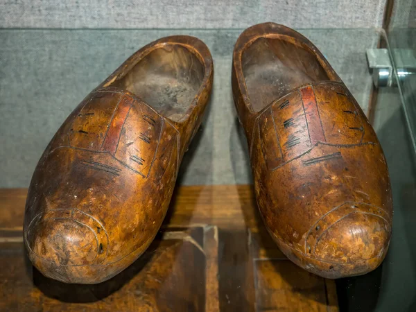 Old medieval wooden shoes.