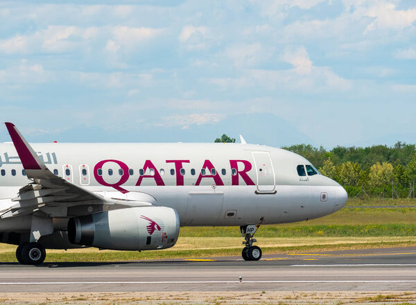 Otopeni, Romania - 05.08.2021: Qatar Airways Airbus A320-232 (A7-AHT) on the airport runway at Henri Coanda International Airport.