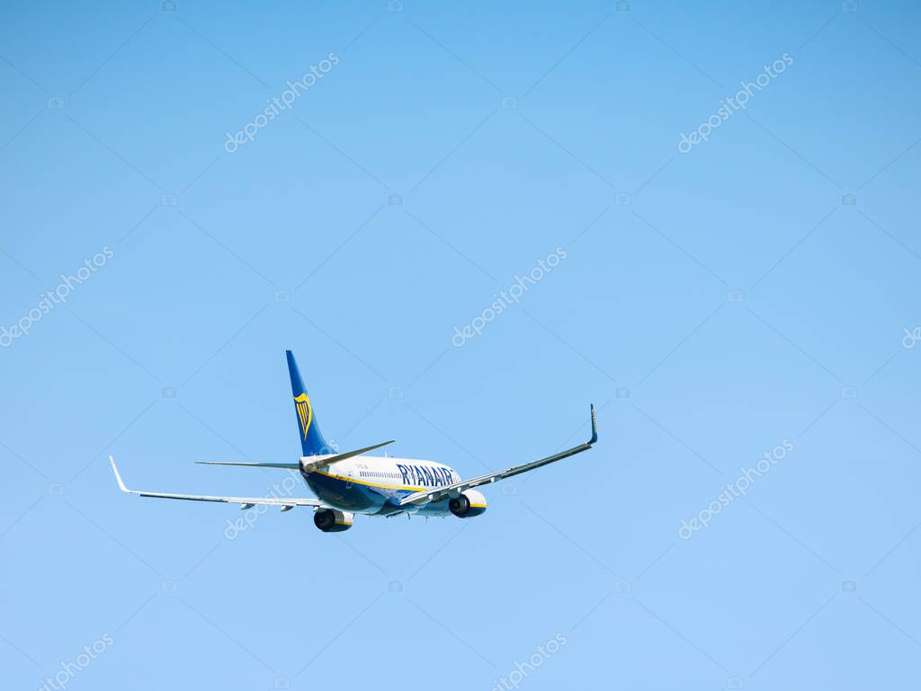 Otopeni, Romania - 05.14.2021: Otopeni, Romania - 05.08.2021: Ryanair Boeing 737-8AS (EI-EGD) flying against blue sky. Airplane takes off from Henry Coanda International Airport.