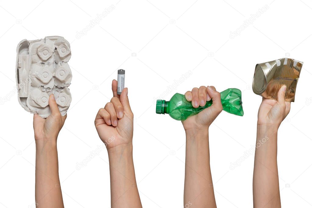 Recycling Garbage and separate Trash. Hand holding waste cardboard, battery, pet, can on isolated white background.