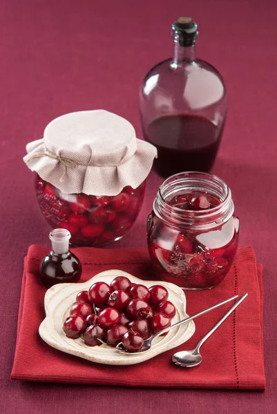 Cherry in juice in the pot — Stock Photo, Image