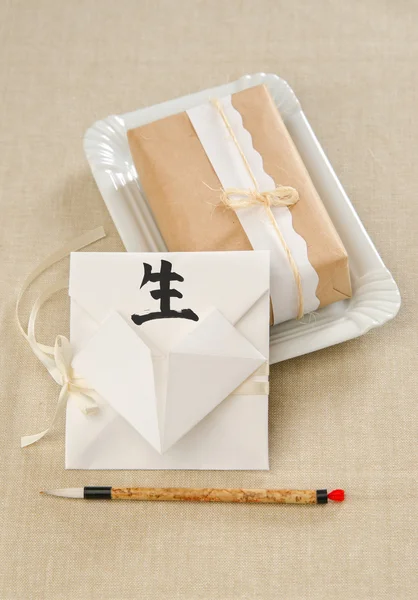 Envelope origami heart with hieroglyph live — Stock Photo, Image