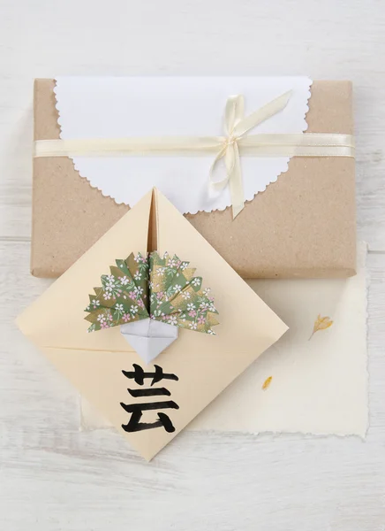 Origami envelope with cloves hieroglyph art — Stock Photo, Image