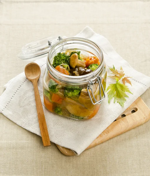 Canned mushroom boletus with broccoli — Stock Photo, Image