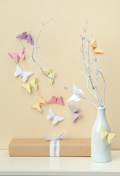 Origami butterflies on branches in a vase — Stock Photo, Image