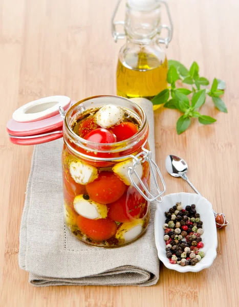 Mozzarella cheese with cherry tomatoes — Stock Photo, Image