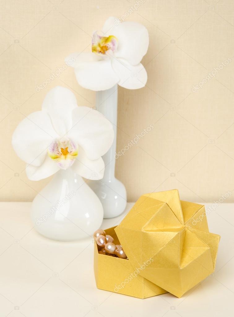 Box Origami vase with orchids
