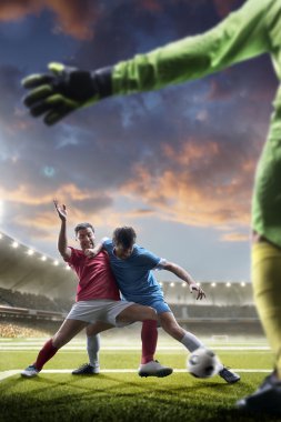 Futbolcular günbatımı Stadyumu arka plan eylem içinde