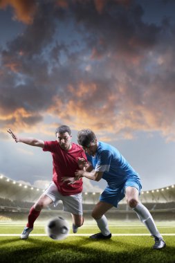 Futbolcular günbatımı Stadyumu arka plan eylem içinde