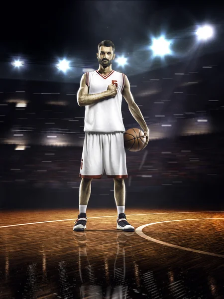 Basketbal speler draaiende bal — Stockfoto