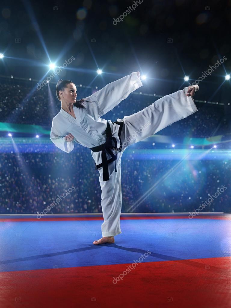 Professional female karate fighter — Stock Photo © 103tnn 59978475