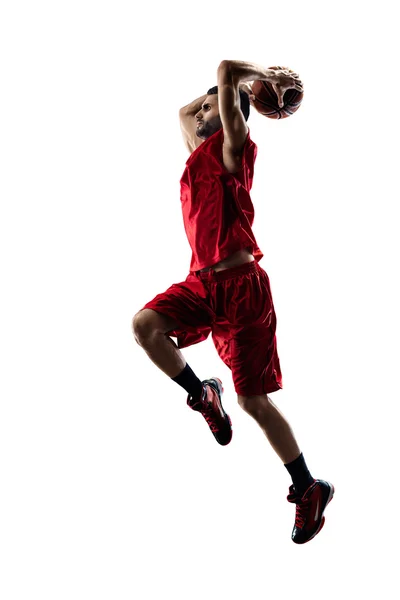 Geïsoleerde basketbalspeler in actie is hoog vliegen — Stockfoto