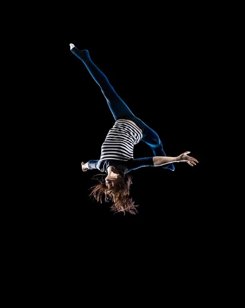 Isolated black young girl is jumping on trampoline — Stock Photo, Image