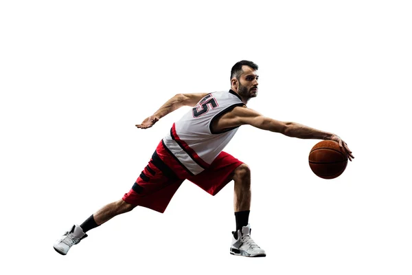 Basketbalspeler in actie geïsoleerd op wit — Stockfoto