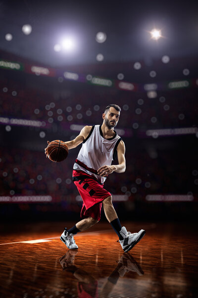 red Basketball player in action