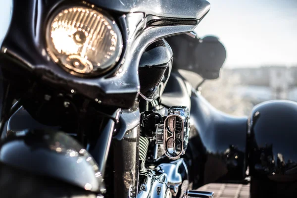 Black trike standing on the light street — Stock Photo, Image