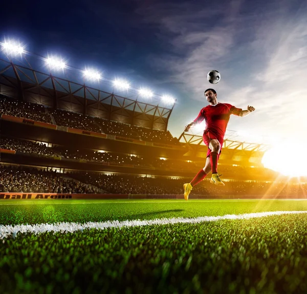 Jogador de futebol em ação — Fotografia de Stock