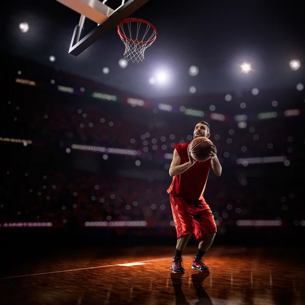 Jogador de basquete vermelho em ação — Fotografia de Stock