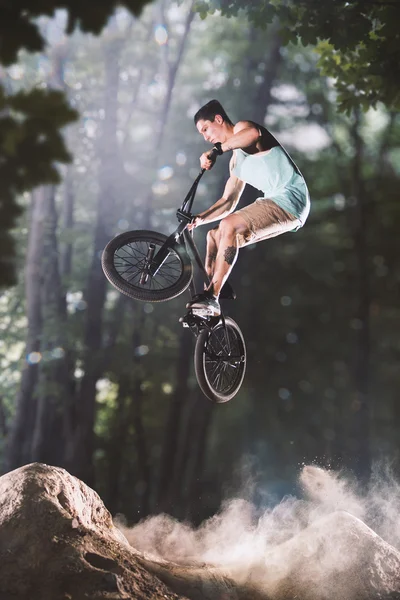 Bmx bike rider in the forest — Stock Photo, Image
