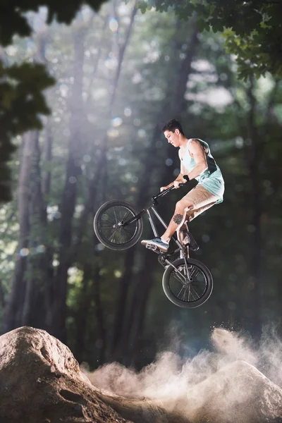 Bmx bike rider in the forest — Stock Photo, Image