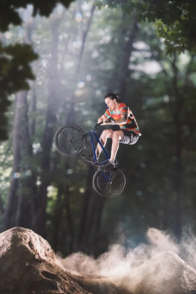 Bmx bike rider in the forest — Stock Photo, Image