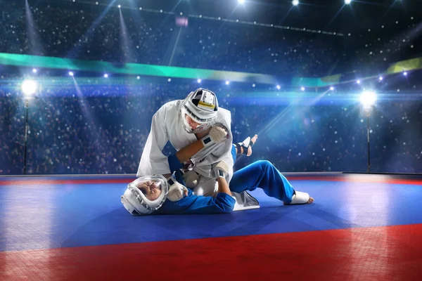 Two kudo fighters are fighting on the grand arena — Stock Photo, Image