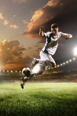 Futbolcu günbatımı Stadyumu arka plan eylem içinde