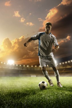 Futbolcu günbatımı Stadyumu arka plan eylem içinde