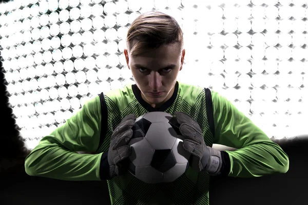 Goalkeeper in green ready to save on highlights Royalty Free Stock Photos