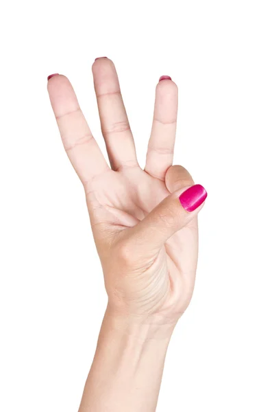 Femme main faisant signe trois — Photo
