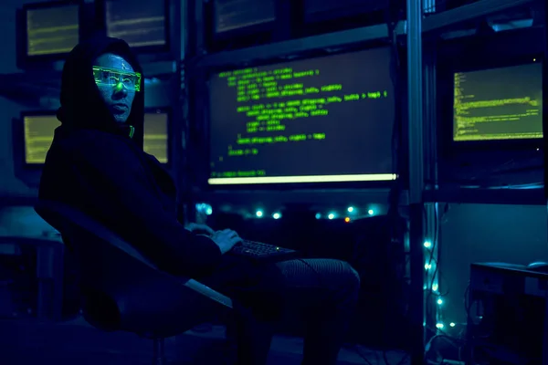 Cyber hacker breaks into databases to obtain information using a computer. — Stock Photo, Image