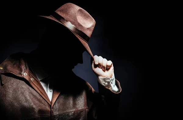 Photo Shaded Detective Portrait Jacket Putting Hat Black Background — Stock Photo, Image