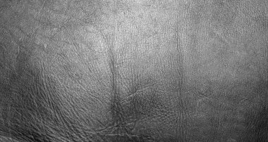 Siyah deri bir dokunun arka plan fotoğrafı..