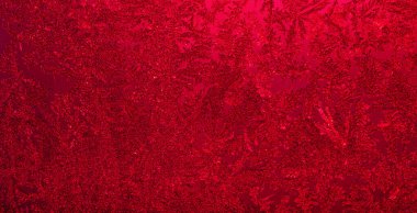 Üst röfleli koyu kırmızı renkli donmuş camın arkaplan desenli fotoğrafı.