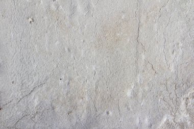Gri renkli beton duvarın doku fotoğrafı.