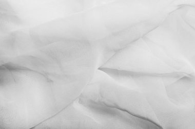 Beyaz renkli ağ katlanmış kumaş arkaplan fotoğrafı.