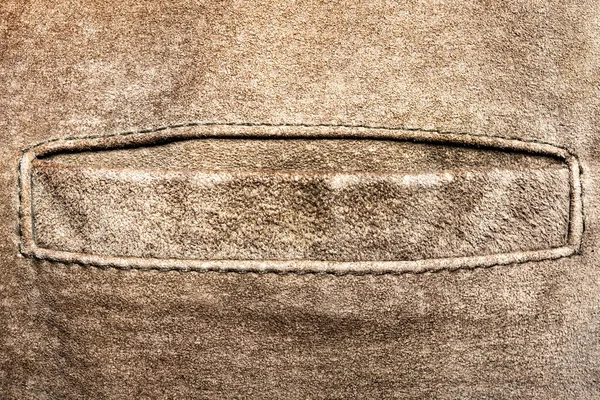 ブラウン色のスエードレザーポケット素材のテクスチャ背景写真 — ストック写真