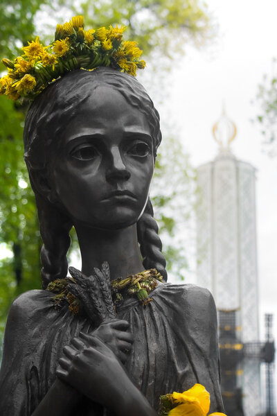 Starving girl statue. Memorial in Commemoration of Famines' Victims in Ukraine.