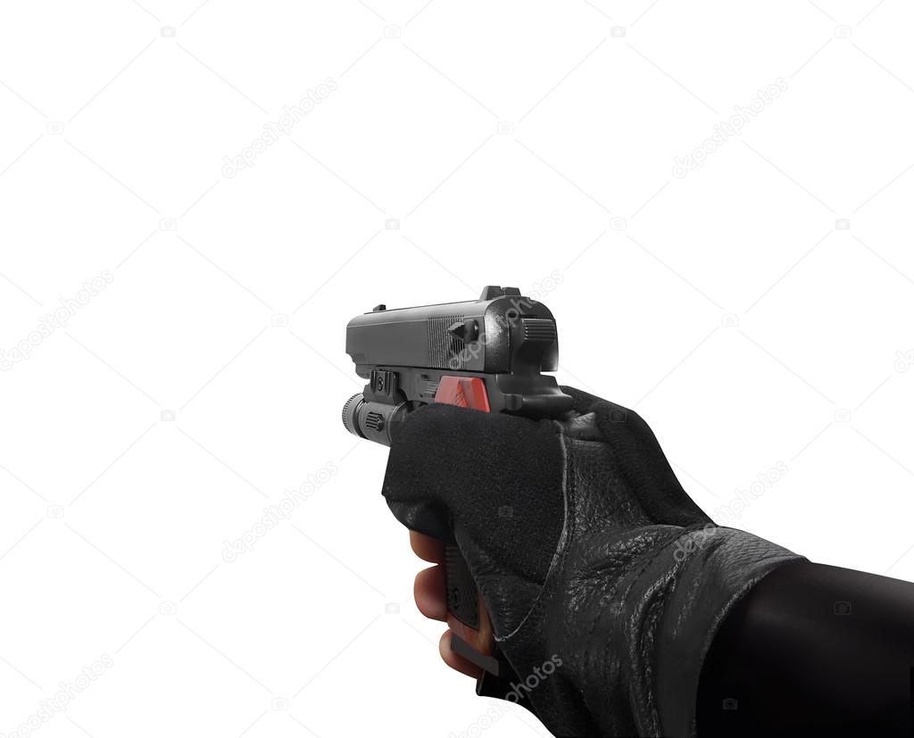 Hand holding a handgun.