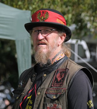 Scunthorpe, Lincolnshire, UK. August 2025. Warlock motorcycle club annual show with music, characters, cars and bikes. Vintage and modern. Customised and renovated.